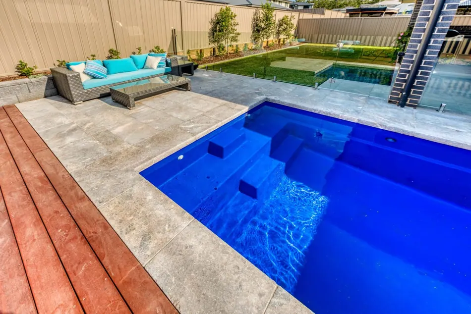 Fibreglass swimming pool design and outdoor living area