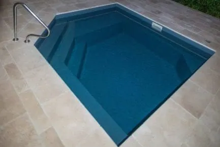 Versace Masterbuilt plunge pool with dark blue water